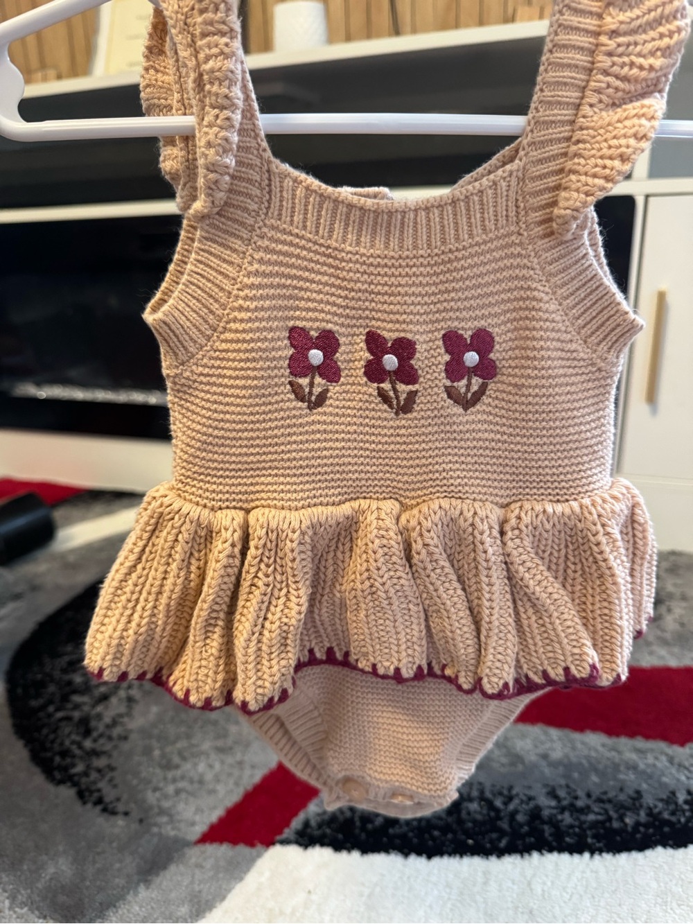 Kids Sleeveless Knit Ruffle Romper in Light Peach with Flower Embroidery